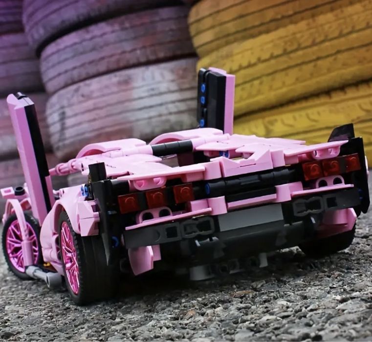 Контсруктор 1300 дет спортивна машина 36*17см lego technic рожева