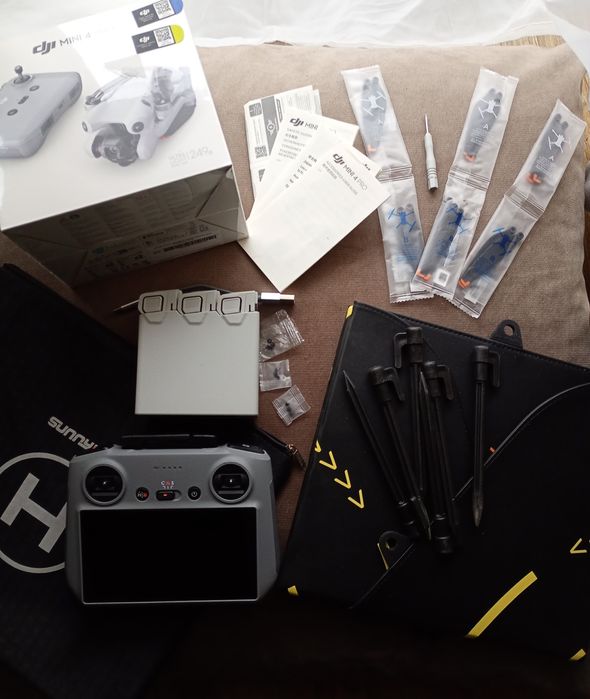 Nowy dron DJI mini 4 PRO + fly more combo, RC2, 4 baterie, dodatki