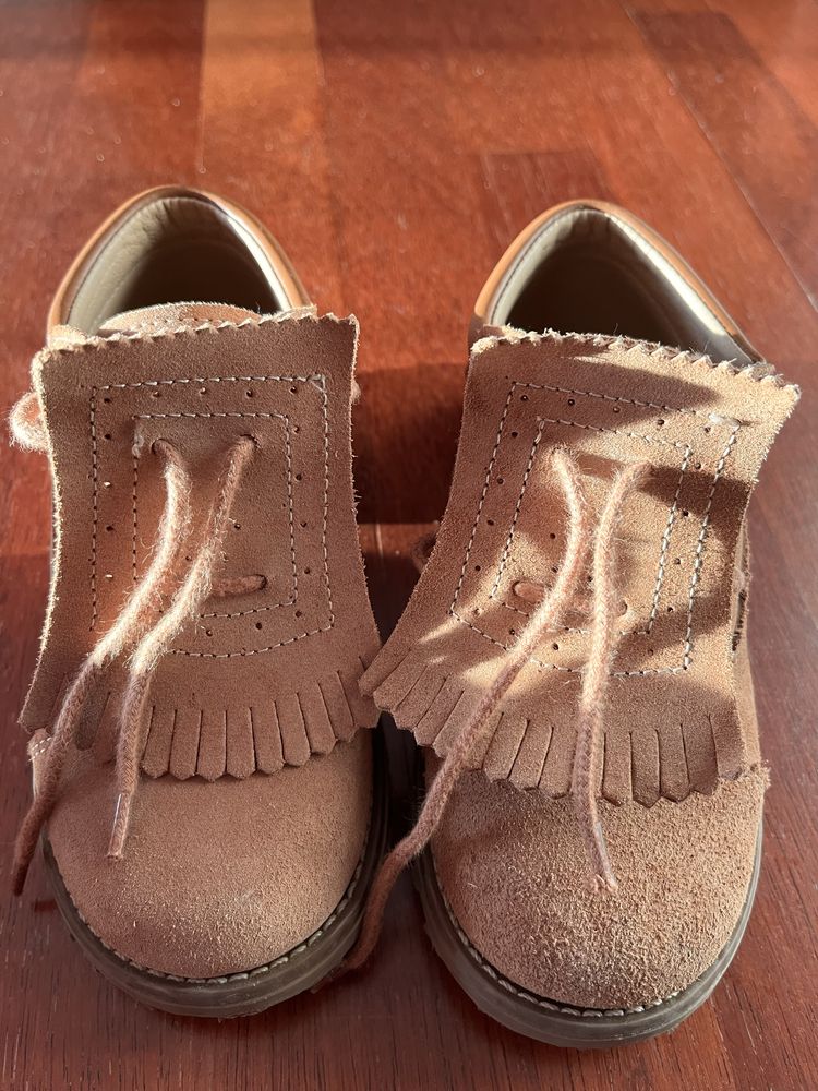 Sapatos com pouco uso
