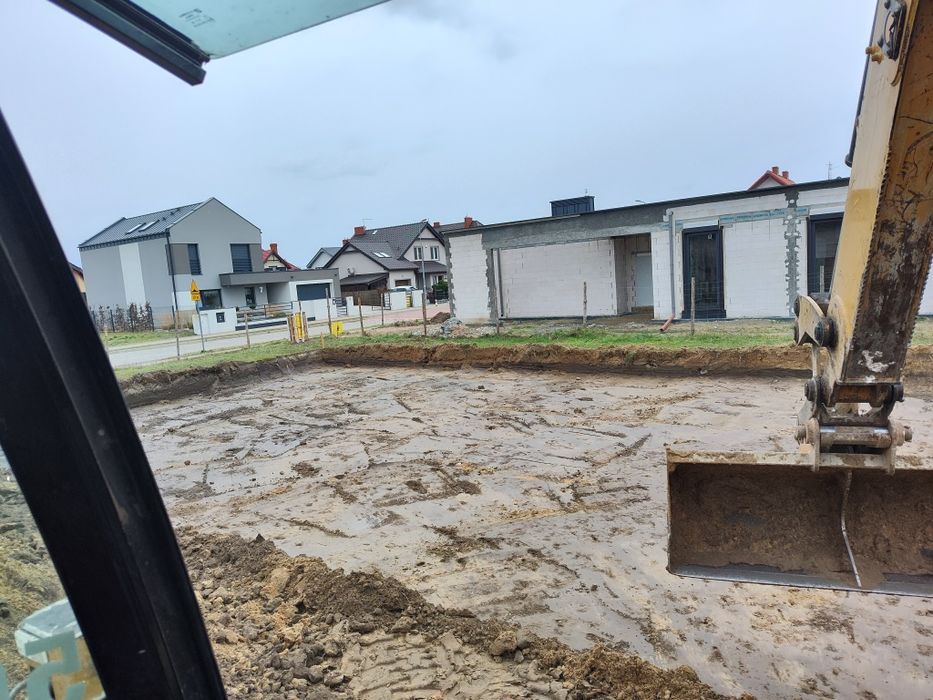 Roboty Ziemne Usługi koparko  ładowarką CAT Pracę Ziemne Odśnieżanie