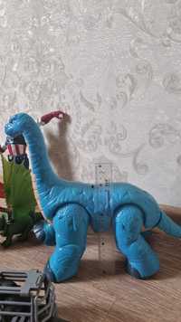 Лот іграшки динозаври