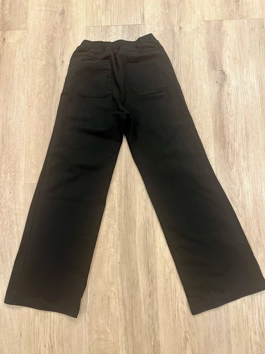 Spodnie czarne dziewczęce Coccodrillo 158