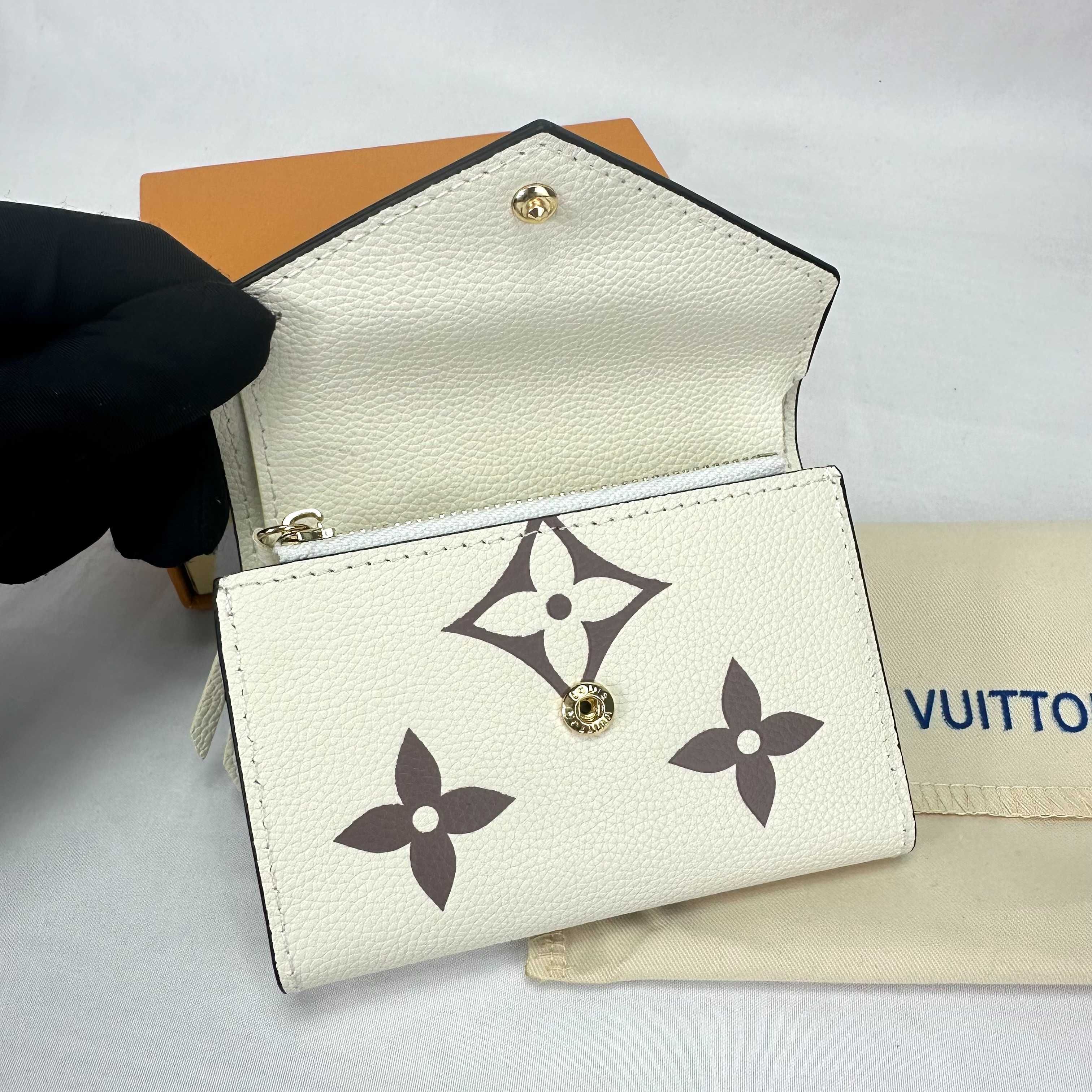 LOUIS VUITTON Portfel Louis Vuitton składany na trzy części