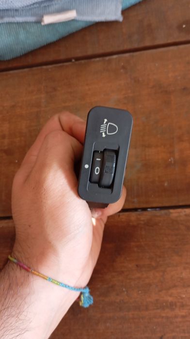 Interruptor regulador do nível dos faróis Peugeot 106