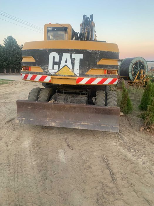 Koparka kołowa CAT M315 - 1996 rok - 15331 mh