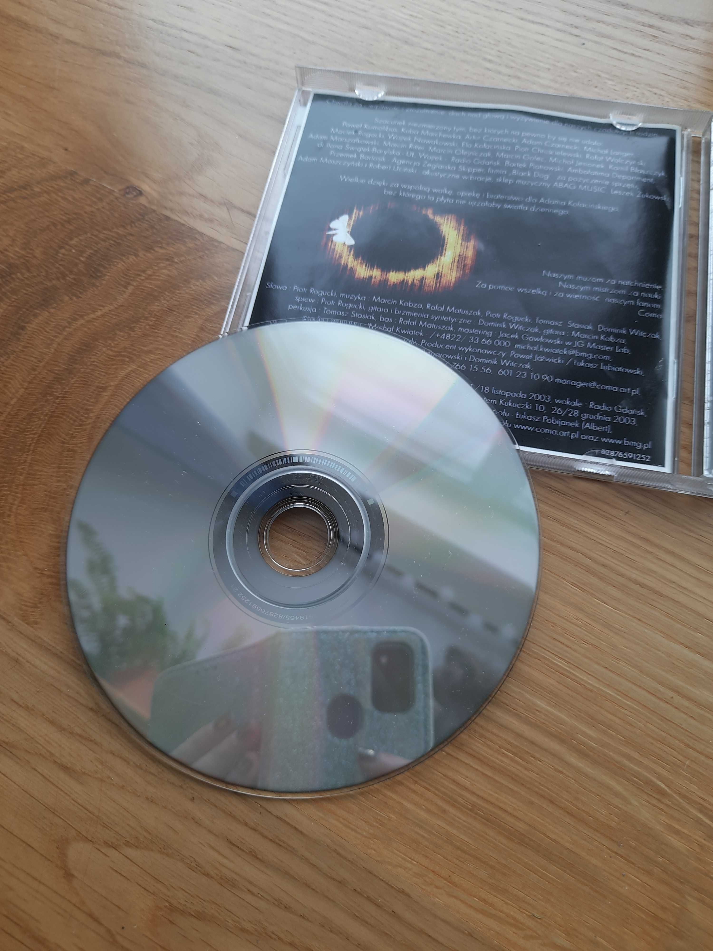 COMA "Pierwsze wyjście z mroku" wydanie z 2004