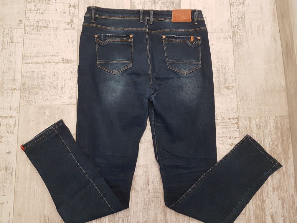 Spodnie jeans damskie