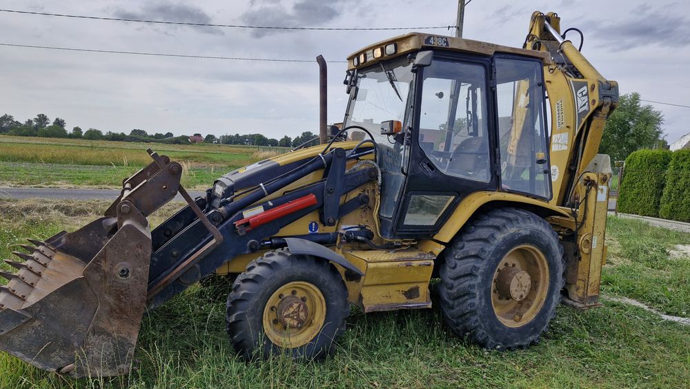 Koparko ładowarka CAT 438C