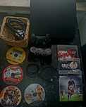 PS3 semi nova com comandos e jogos
