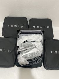Зарядка Tesla нова