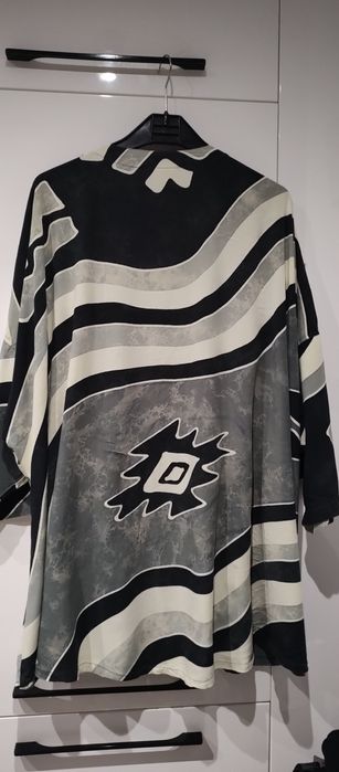 Przepiękna narzutka z kieszeniami , kardigan