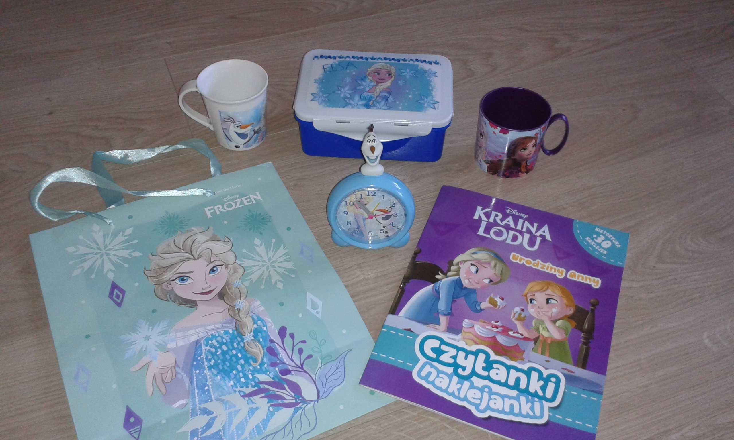 Zestaw Kraina Lodu śniadaniówka kubek budzik książeczka puzzle