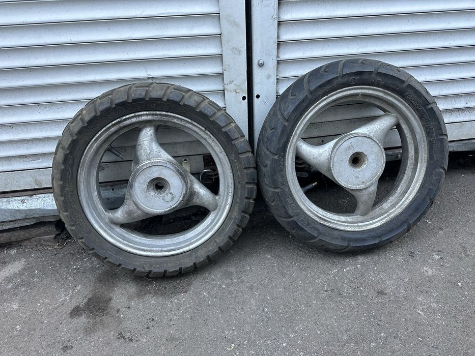 Колесо скутер 120/70-12 (19шлицов)