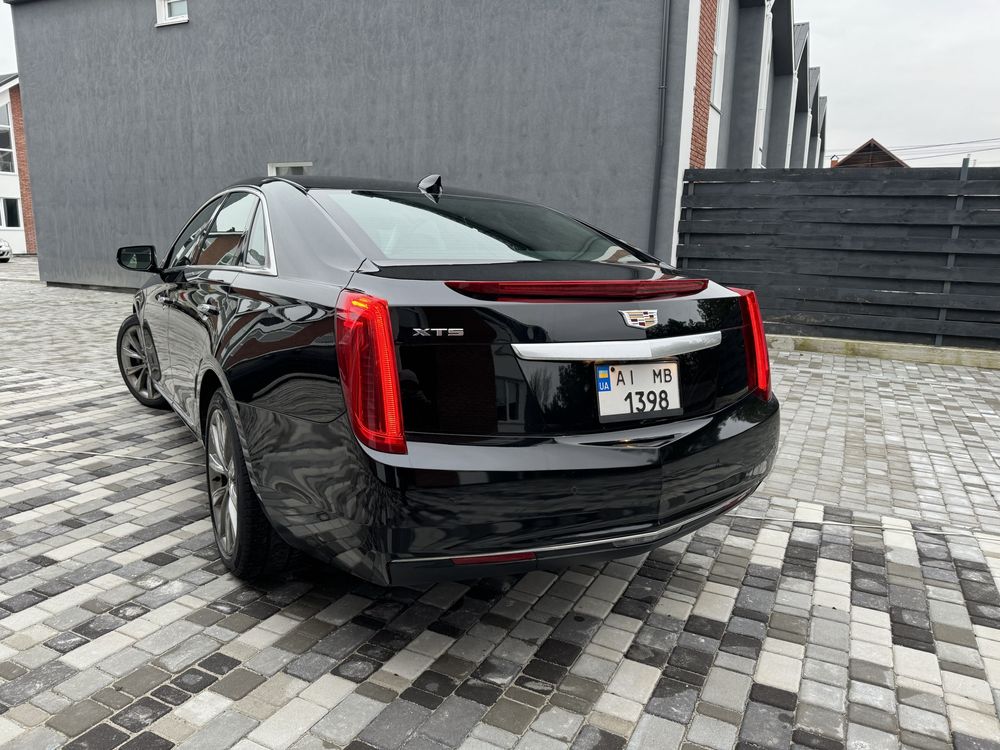 cadillac xts комфортне авто на газу