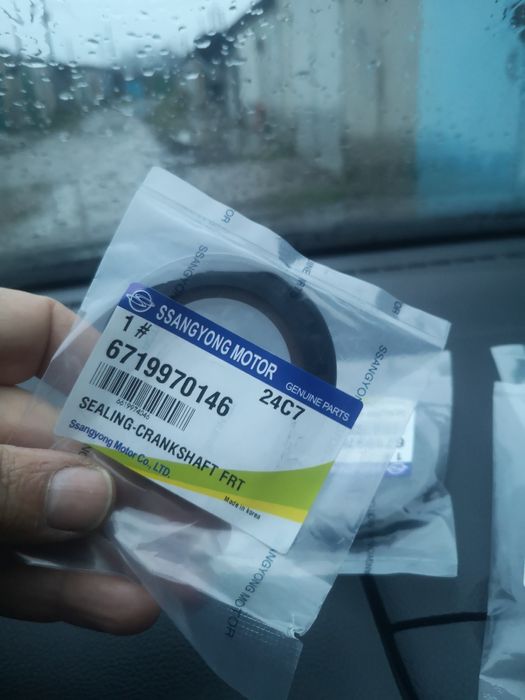 Korando C сальник коленвала передний.