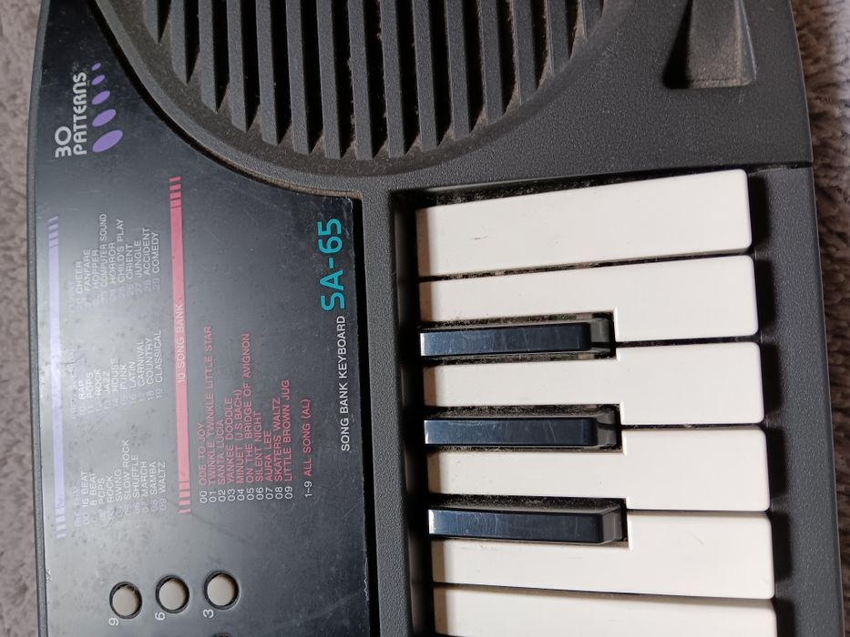 Teclado Casio Song Bank SA-65 e suporte