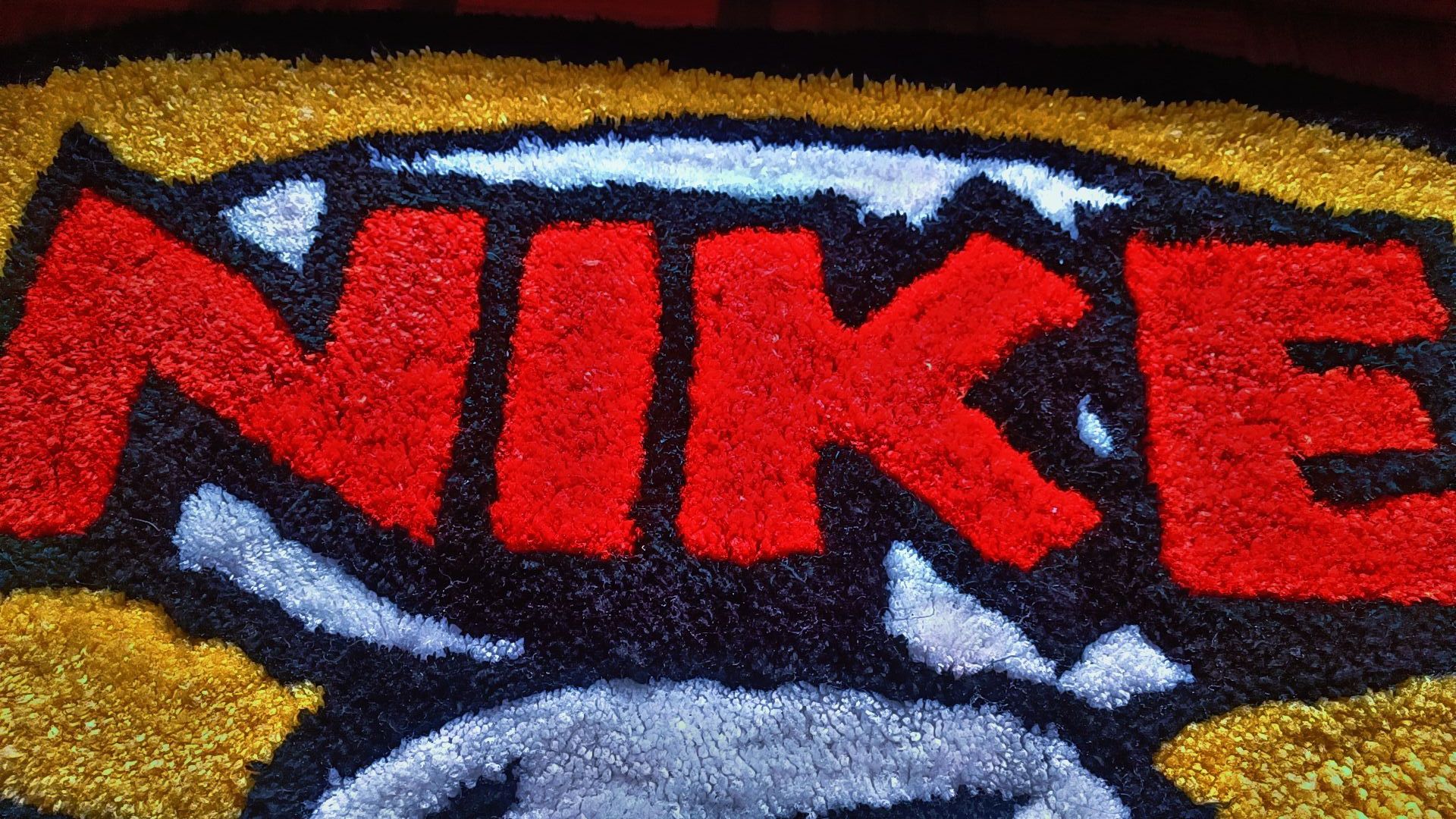 Tapete Nike tipo tufting