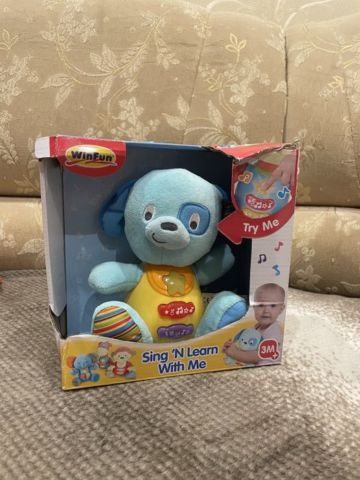 іграшки підвісні, песик з мелодіями