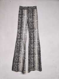 Spodnie legginsy z szerokimi nogawkami dzwony elastyczne rozmiar 34 36