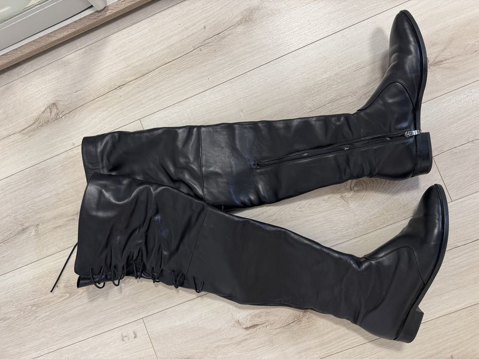 Шкіряні ботфорти за коліно