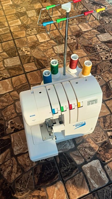 Оверлок, Minerva M3335DS, 2/3/4 нитки, диференціальна подача.