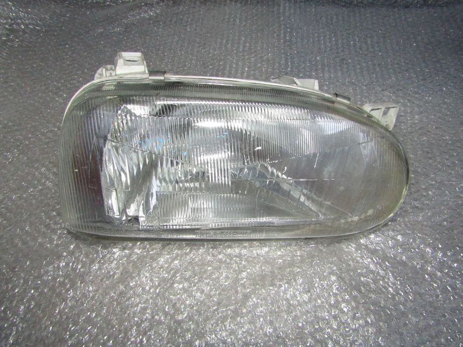 Farol VW GOLF III , usado em bom estado, lado direito
