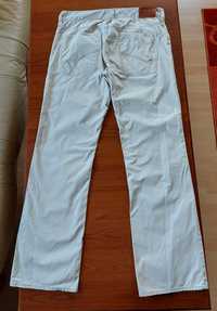 Jasnobeżowe jeansy Tommy Hilfiger W34 L34