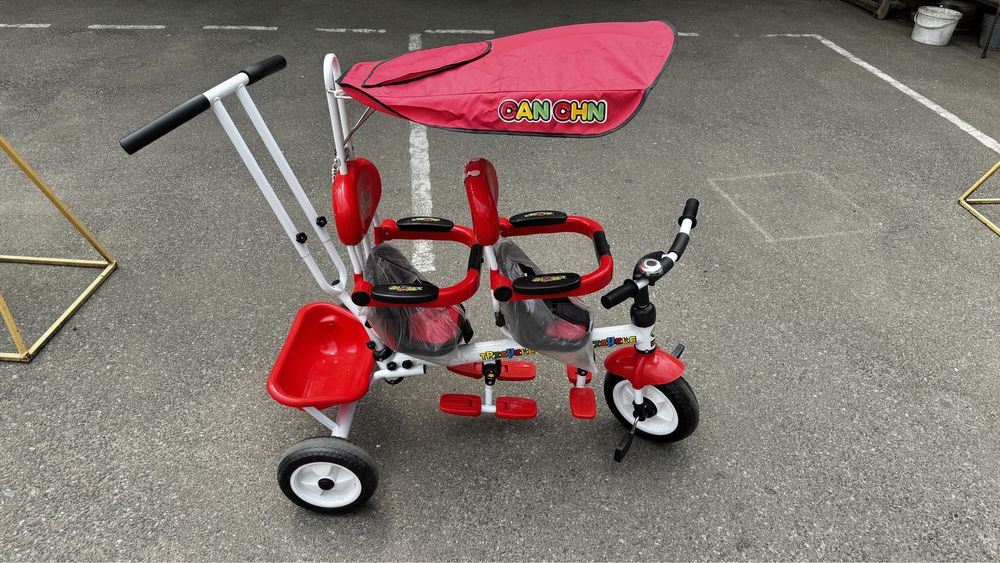 Велосипед для блізняшок