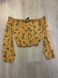 Top amarelo de ombro