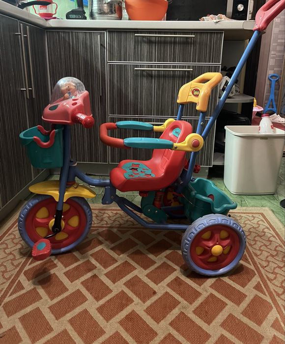 Продам детский велосипед с ручкой