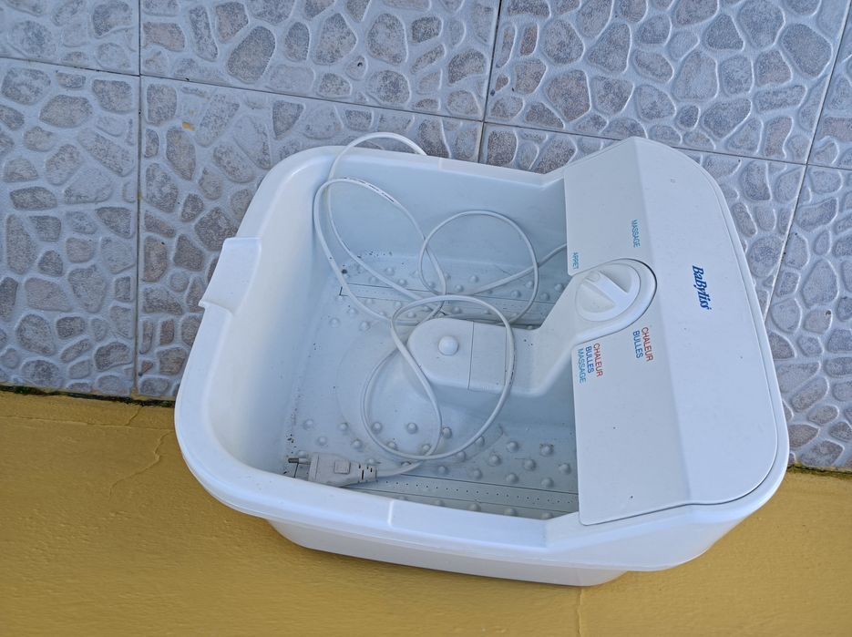 Massajador de pés impecável