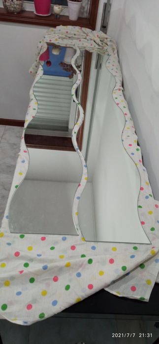 Espelhos em forma de onda novos