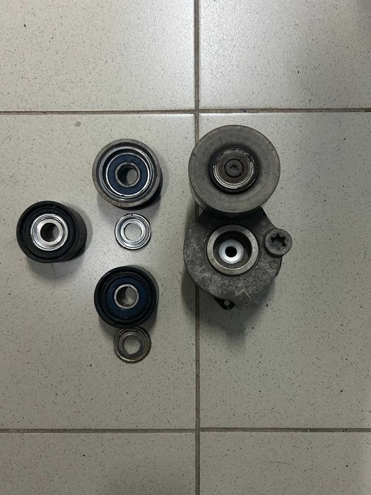 обвідні ролики та натягувач ременя для VW Амарок 3.0