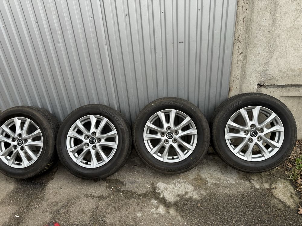 Диски Mazda 16+шини 205 60 16