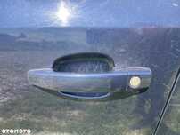 Klamka lewa przednia Opel Vectra C