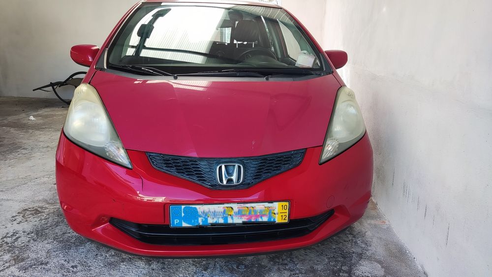 Vendo/Troco Honda Jazz vermelho