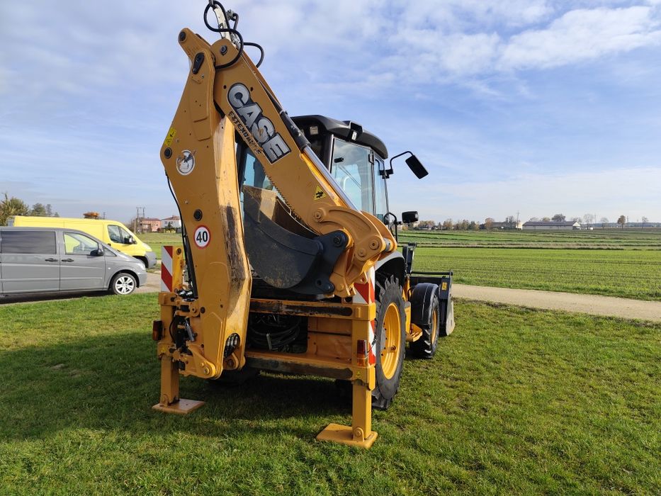 Koparko ładowarka case JCB cat