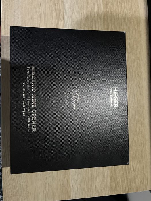 Abre garrafas eletrico