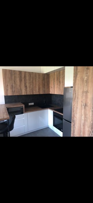 Funcjonalna kawalerka 30m² z parkingiem i komórka lokatorska