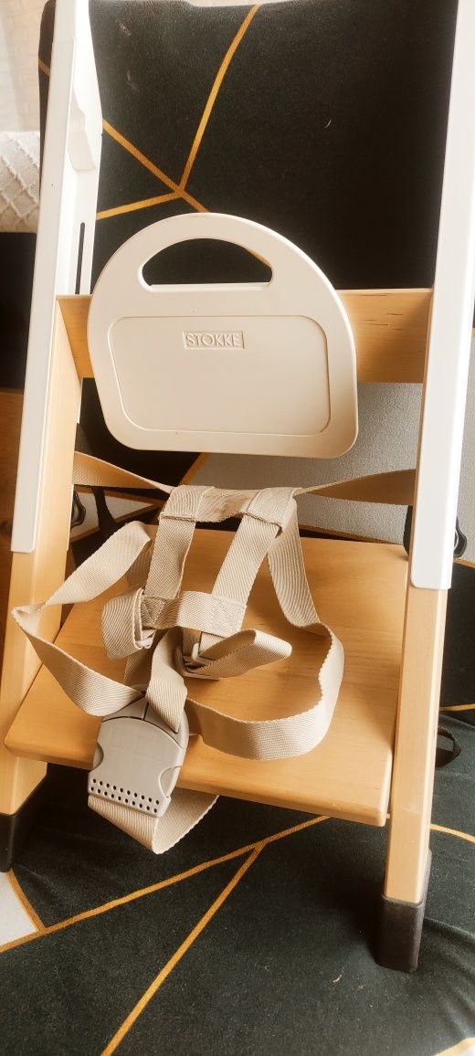 Krzesełko Stokke HandySitt dostawką turystyczne do karmienia