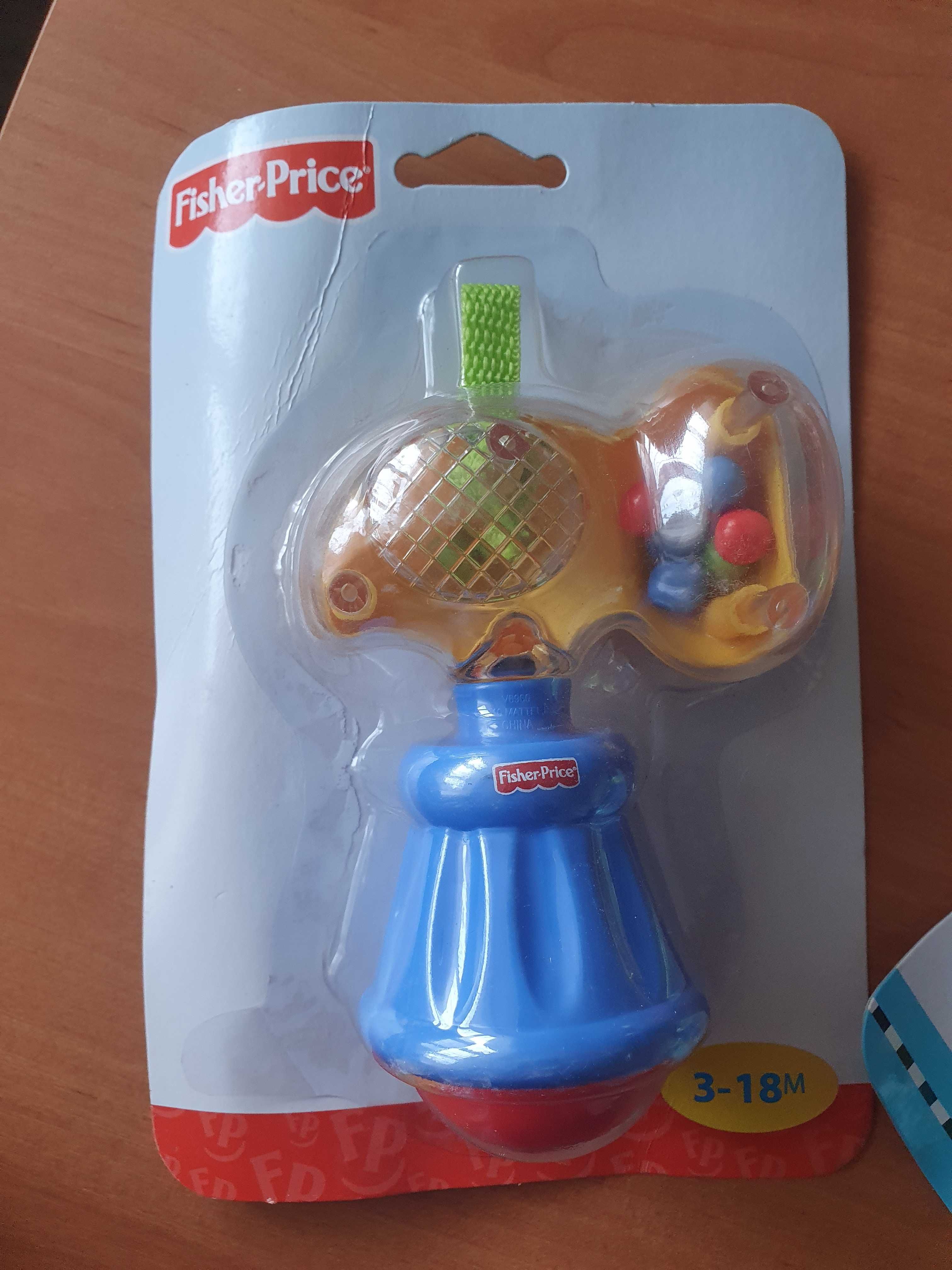 Fisher Price брязкальця та прорізувач