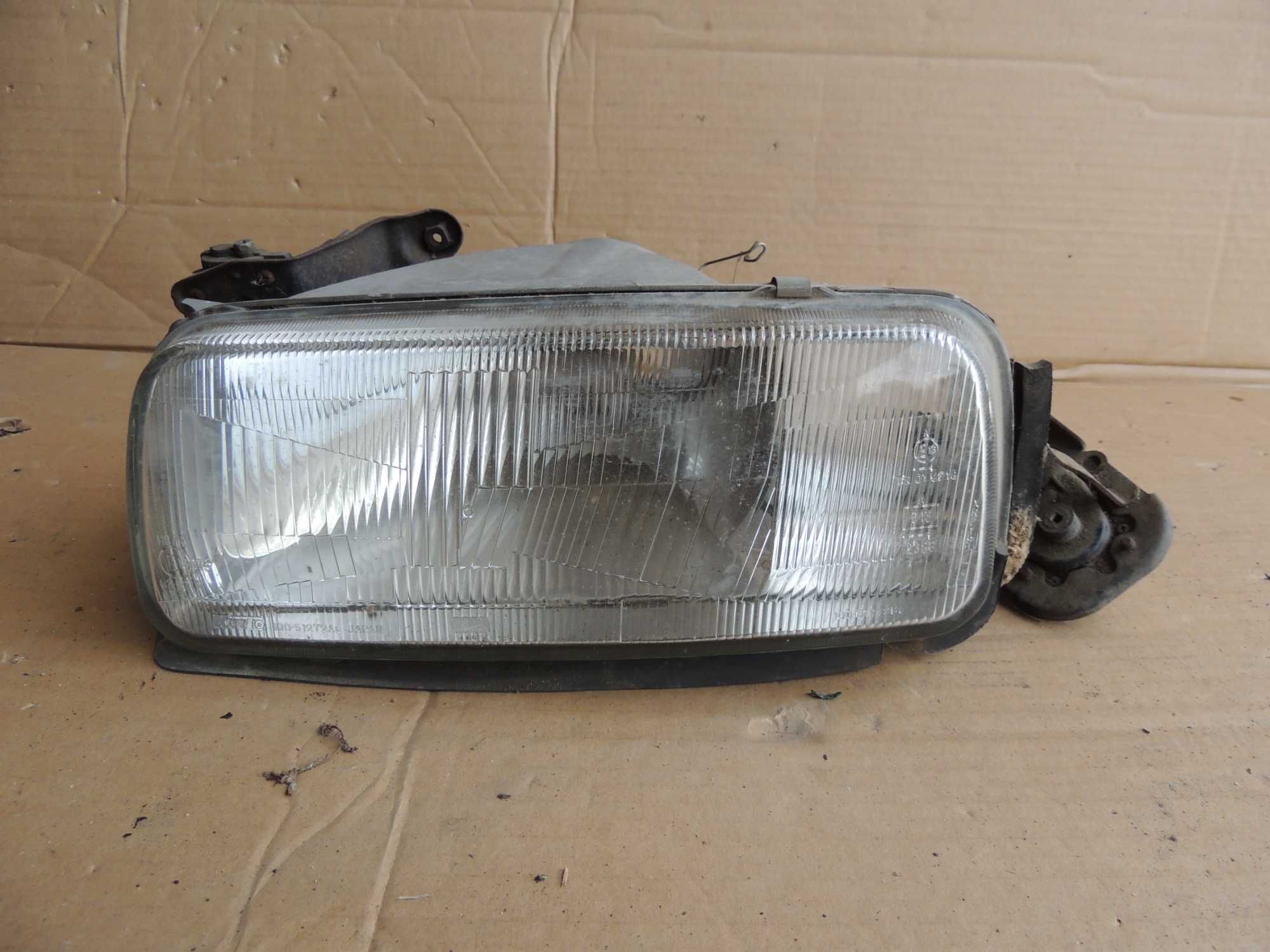 Lampa przednia lewa europejska Daihatsu Applause