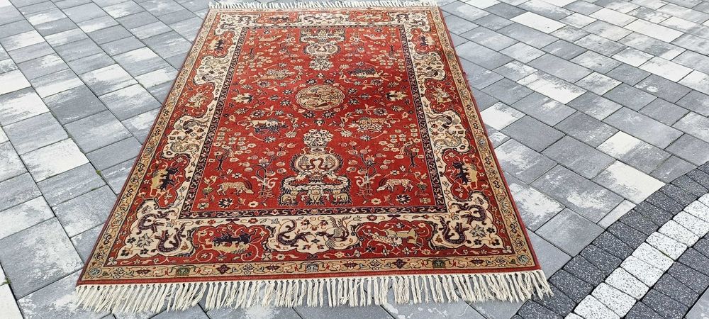 Perski dywan wełniany tkany ręcznie 215 x 132 cm wełna motyw zwierząt