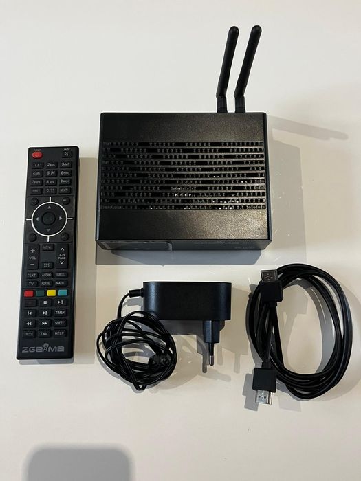 Dekoder ZGEMMA 4K
W zestawie pilot oraz zasilacz. Wszystko