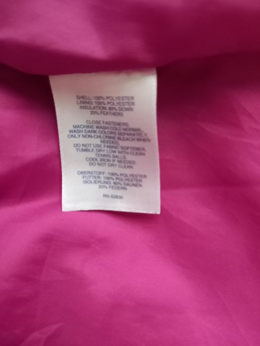 Пухова жіноча желетка