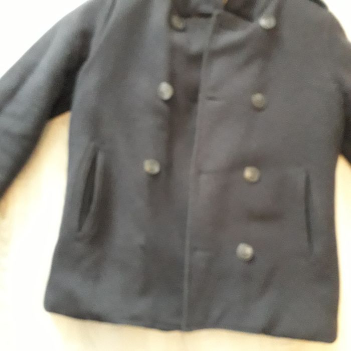 Sprzedan męski plaszcz dobrej marki