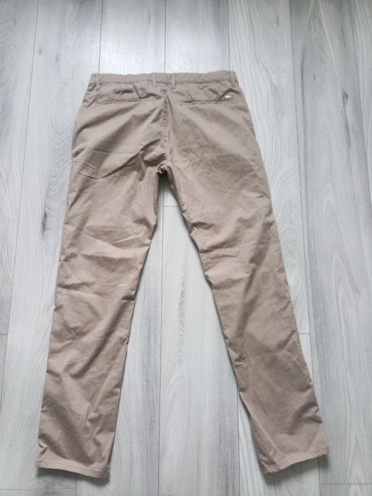 Spodnie męskie  beżowe bawełna. Reserved