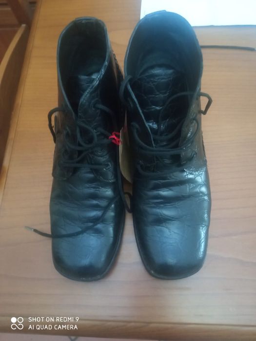 Botas de pele pretas