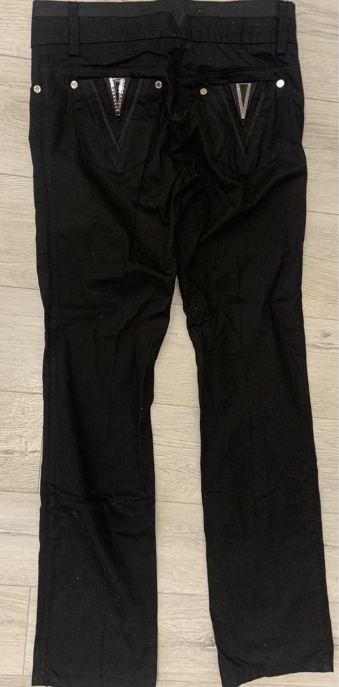 Черные джинсы Versace