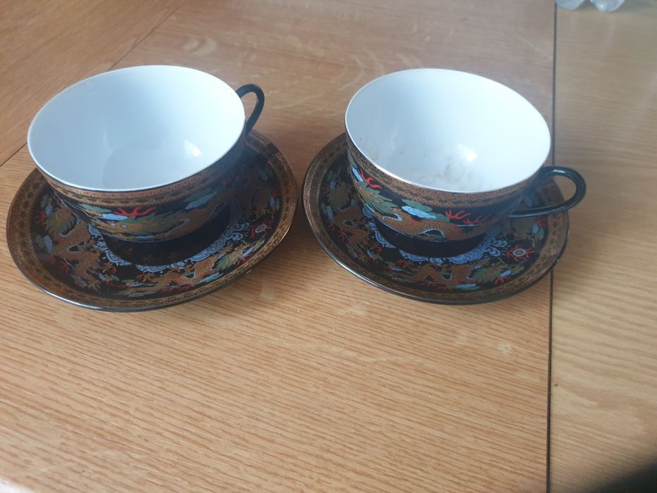 2 Filiżanki czarne z podstawkami we wzory japońska porcelana .2szt.